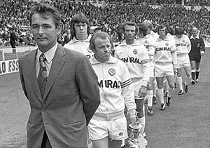 Clough leads out his already disenchanted Leeds players at the Charity Shield in May 1974